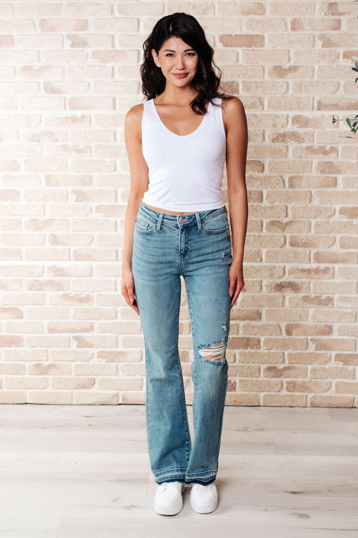 Isla Mid Rise Distressed Released Hem Bootcut Jeans - TheDesignChambersBoutique