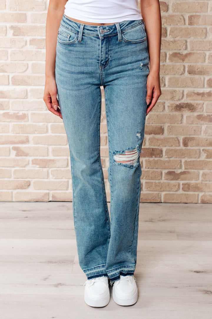 Isla Mid Rise Distressed Released Hem Bootcut Jeans - TheDesignChambersBoutique