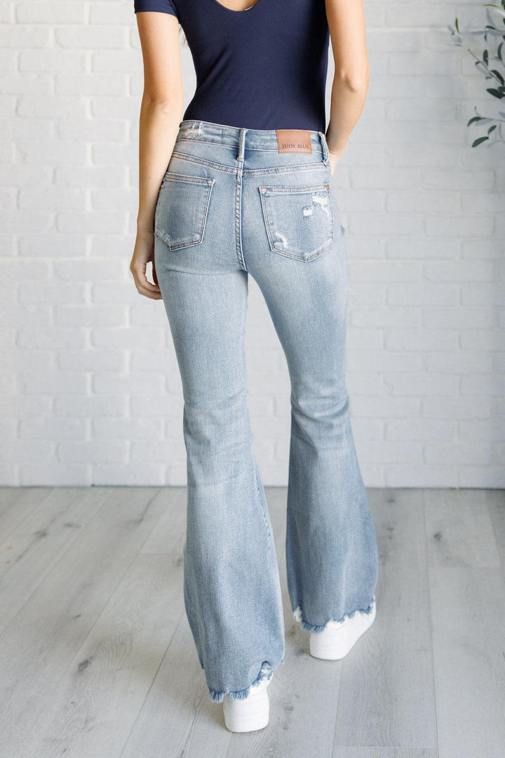 Caroline Mid Rise Control Top Distressed Flare Jeans - TheDesignChambersBoutique