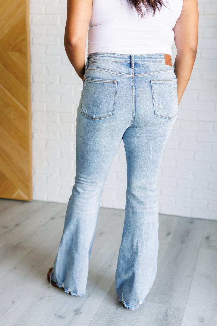 Caroline Mid Rise Control Top Distressed Flare Jeans - TheDesignChambersBoutique