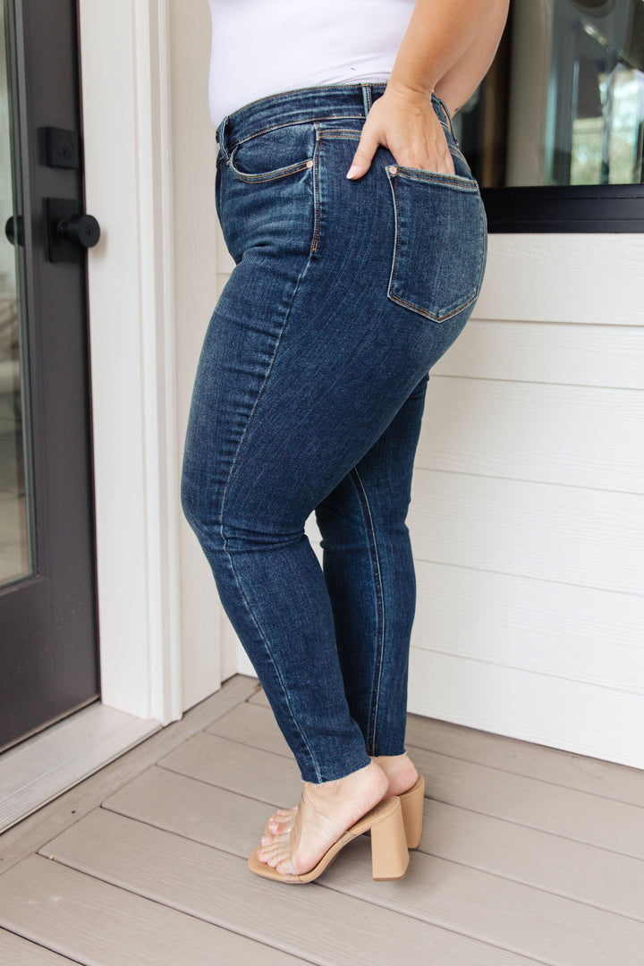 Lydia Mid Rise Vintage Raw Hem Skinny Jeans - TheDesignChambersBoutique