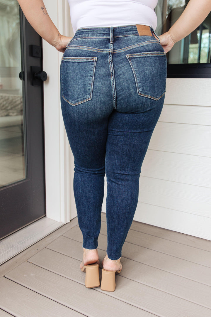 Lydia Mid Rise Vintage Raw Hem Skinny Jeans - TheDesignChambersBoutique